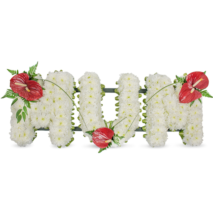 A poignant floral memorial spelling MUM in sculpted capital letters, set against a white background that makes every bloom and leaf read with soft clarity. The letters are composed of closely packed white spray chrysanthemums - hundreds of small, pristine heads arranged to create a seamless, cloud-like texture that conveys purity and quiet comfort. The chrysanthemums' rounded petals form a tolerant, yielding surface that absorbs the light and lends the piece an almost luminescent calm. Three jewel-bright red anthuriums provide focal points: one sits confidently on the upper left of the first M, another nestles into the lower curve of the U, and the third perches on the upper right of the last M. Each anthurium, with its smooth, waxy spathe and pale yellow spadix, introduces warmth and a touch of tropical drama, while surrounding sprays of dark green foliage and delicate fern fronds soften the edges and add depth. Thin, arching stems of grass or similar foliage travel gently across the white letters, connecting the red accents and guiding the viewer's gaze in a gentle flow. A dark green underlying frame is just visible at the margins, lending structural integrity without intruding on the arrangement's tenderness. This is a classic funeral tribute, crafted to be placed at a chapel, wake or graveside and to offer a clear, personal message of enduring affection for a mother. As a local florist familiar with services across Belvedere and the nearby riverside communities, I arrange these with attention to texture, balance and the quiet dignity demanded by a day of remembrance.